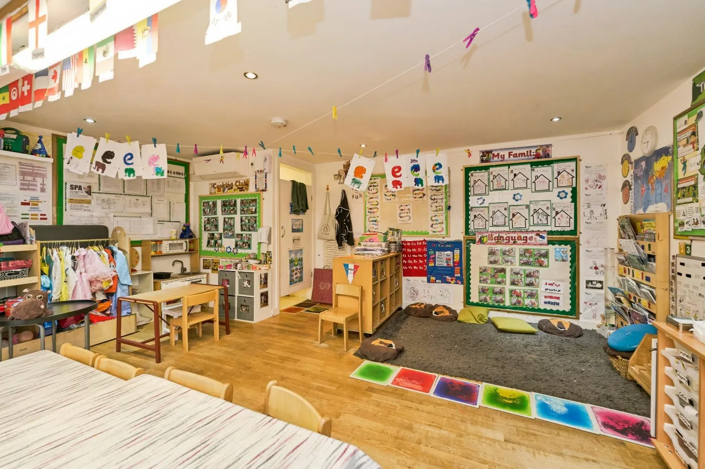 Pre-school room at Montys with learning displays and play spaces